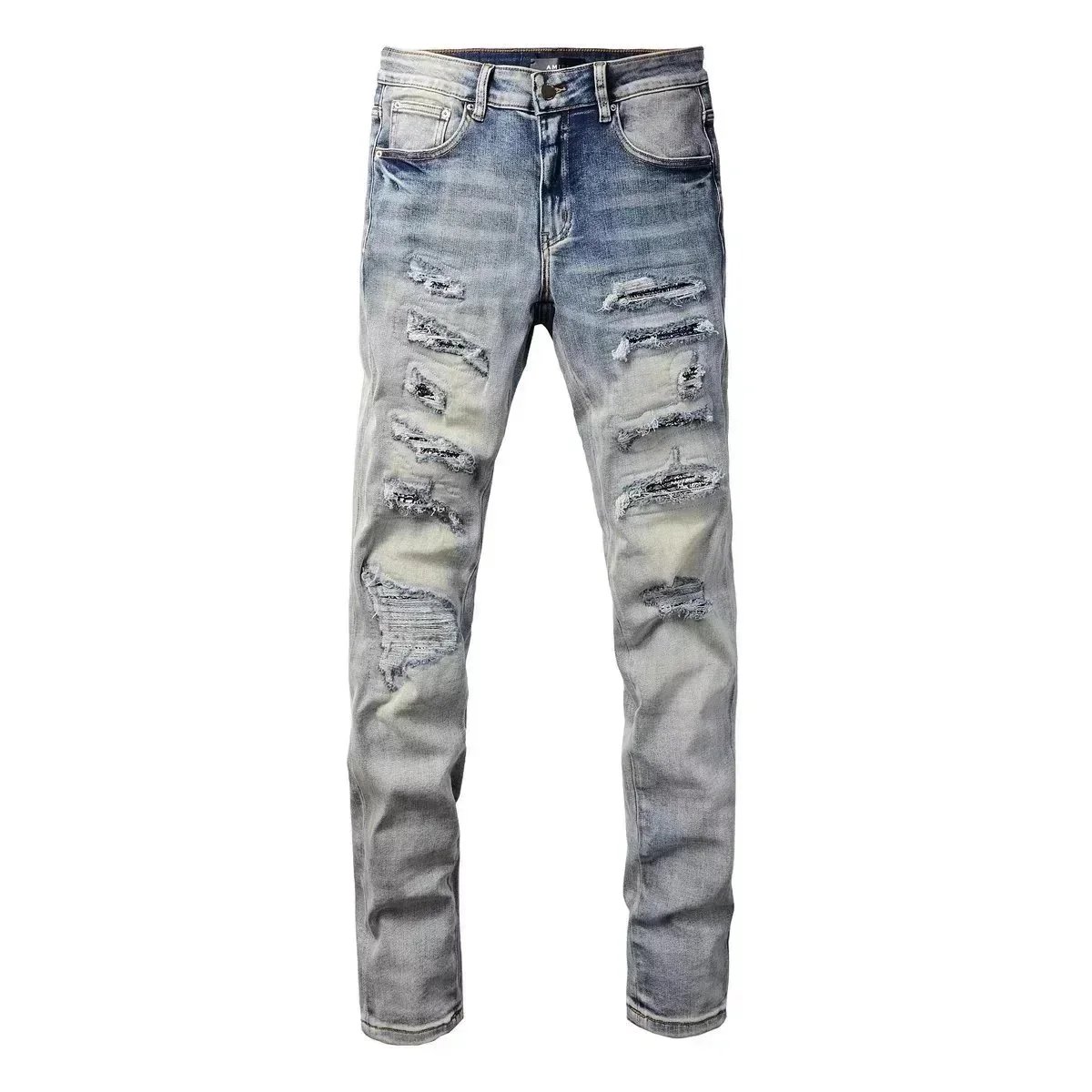 Jeans met verwassen vlakken, scheuren, sporen en zijstrepen
