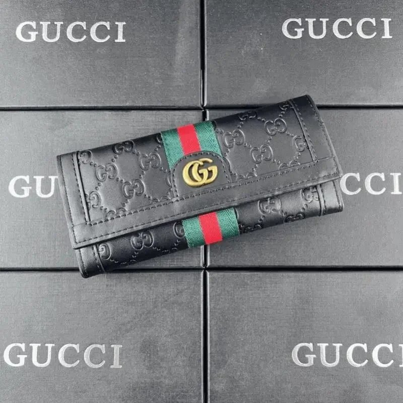 Portafogli Gucci con monogramma e nastro web