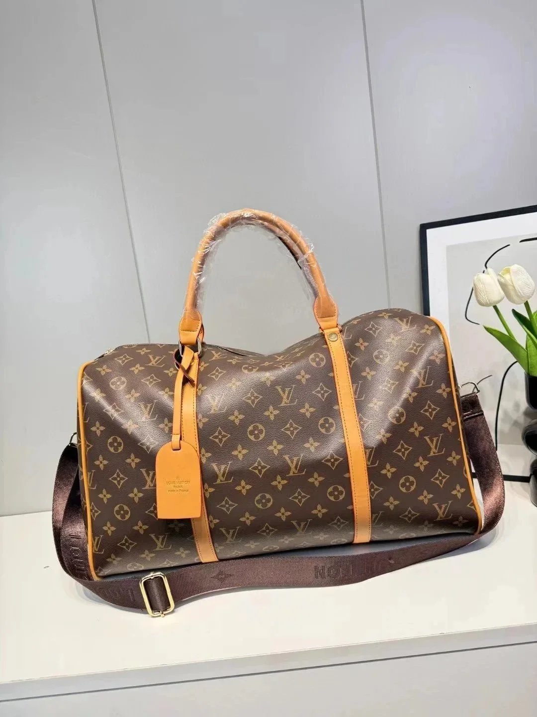 Borsa da viaggio duffle con motivo monogramma e tracolla