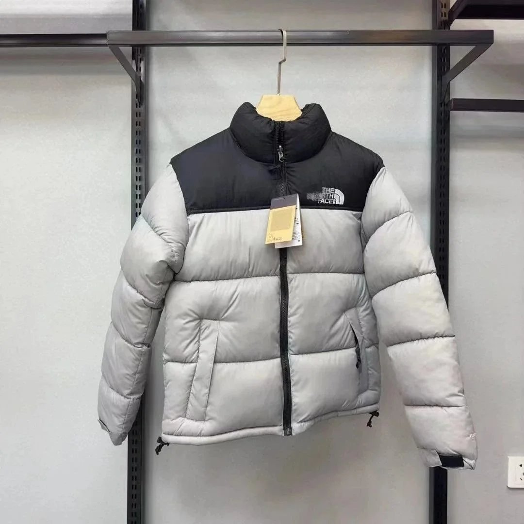 Chaqueta acolchada The North Face con cuello alto y bloques de color