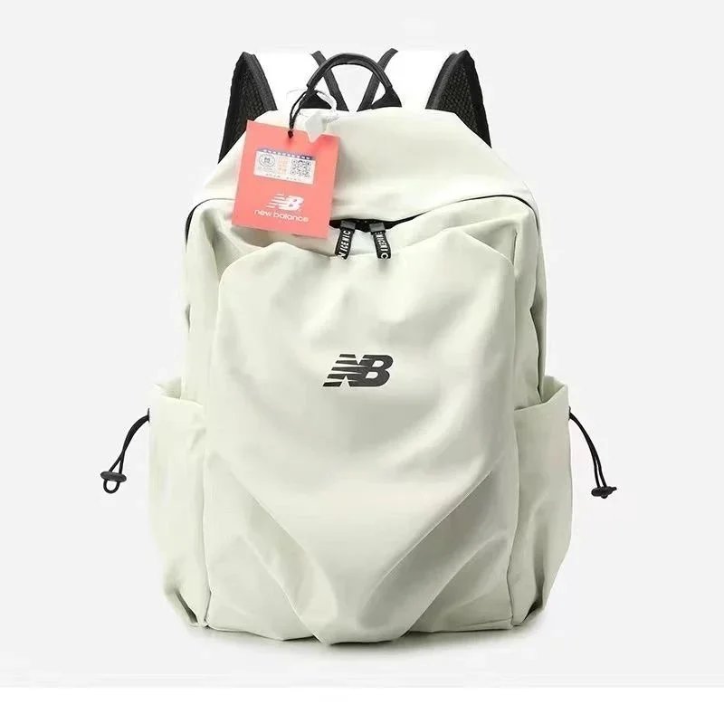 حقيبة ظهر New Balance بشعار وجيوب جانبية برباط تضييق