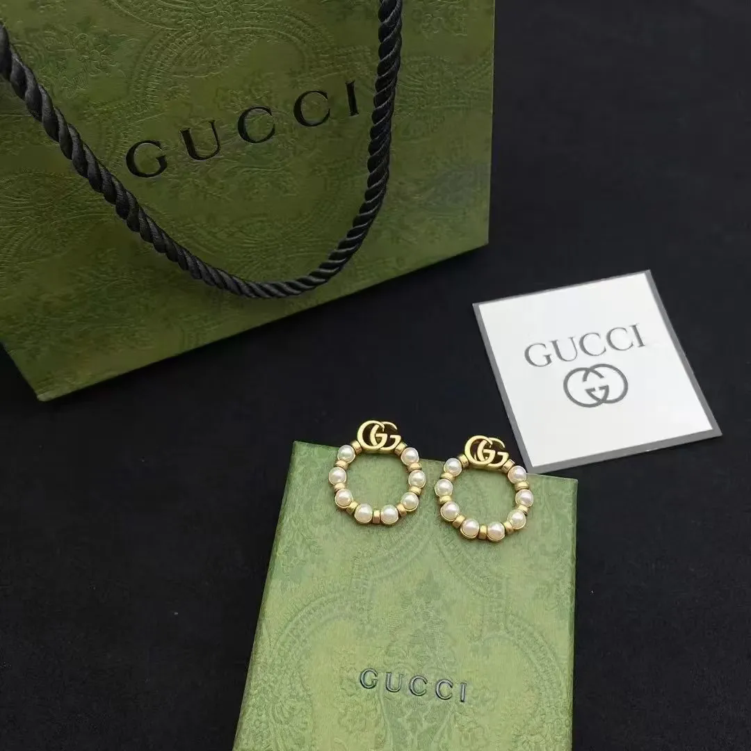 Gucci Runde Ohrstecker mit Doppel-G und Schimmerperlen
