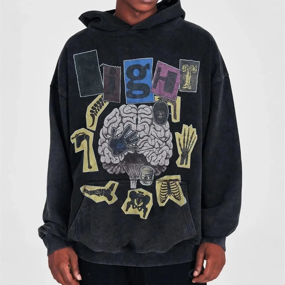 Löst sittande hoodie med grafiska tryck, blektvättad