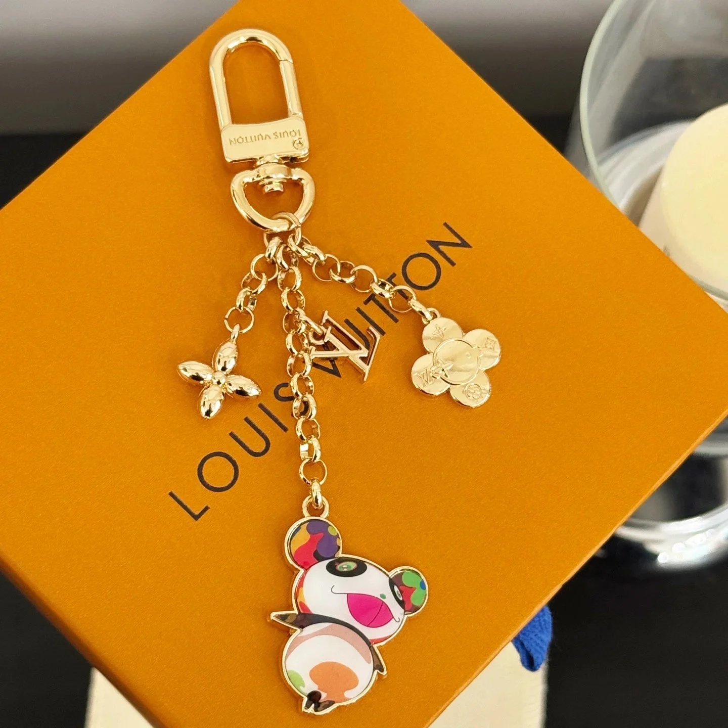 Ciondolo Louis Vuitton Murakami con panda e catena dorata