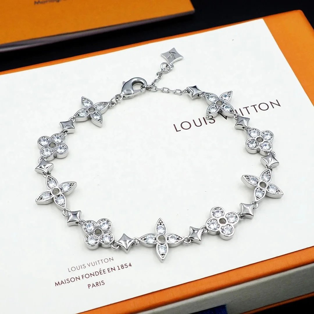 Louis Vuitton armband met bloemmotieven en stenen, goud- of zilvertint