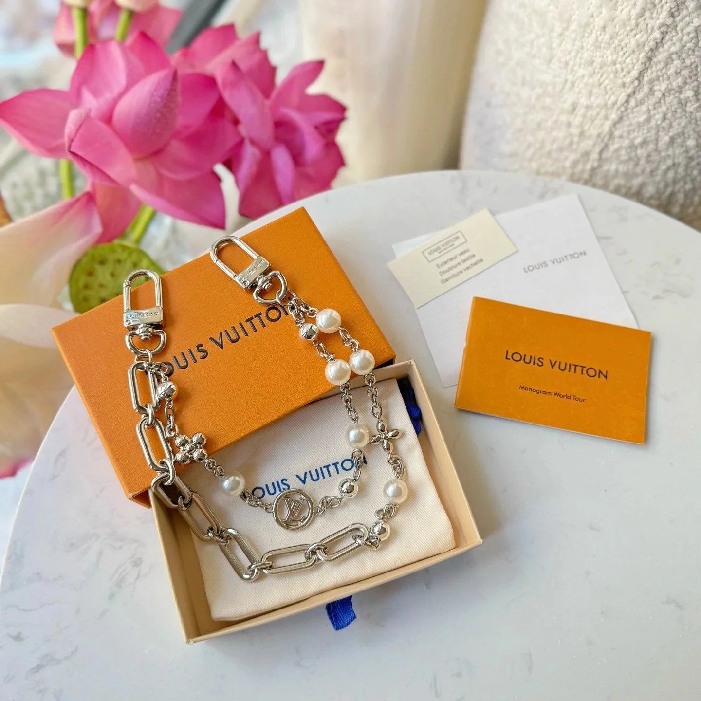 Louis Vuitton Pearl Pouch Chain Bag Charm with Monogram Motif
