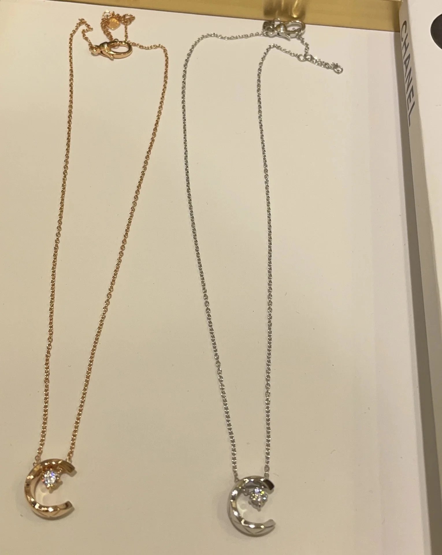 Chanel necklace — lettering · linked chain detail
