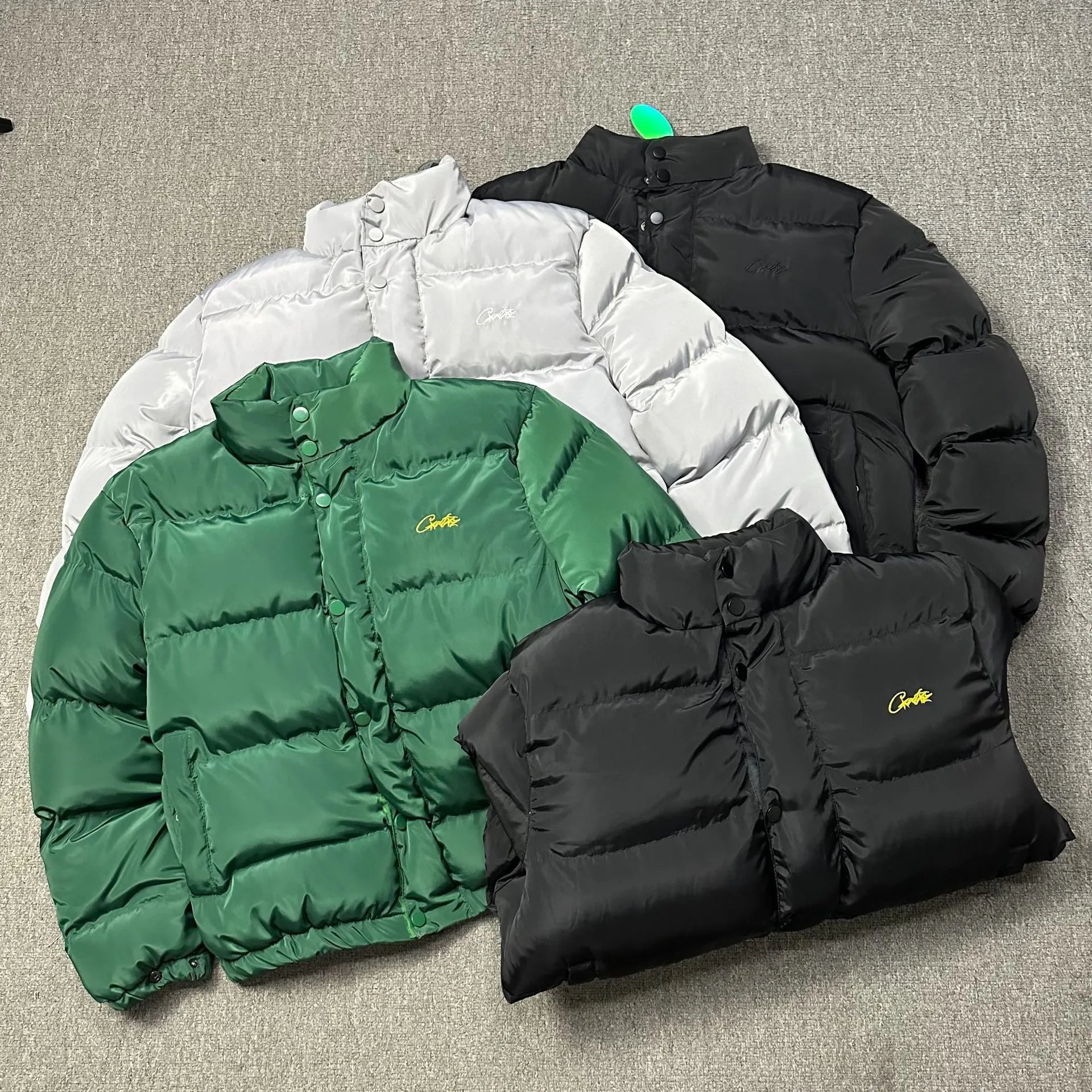 Quilted Stand-Collar Puffer Jacket with Script Chest Motif