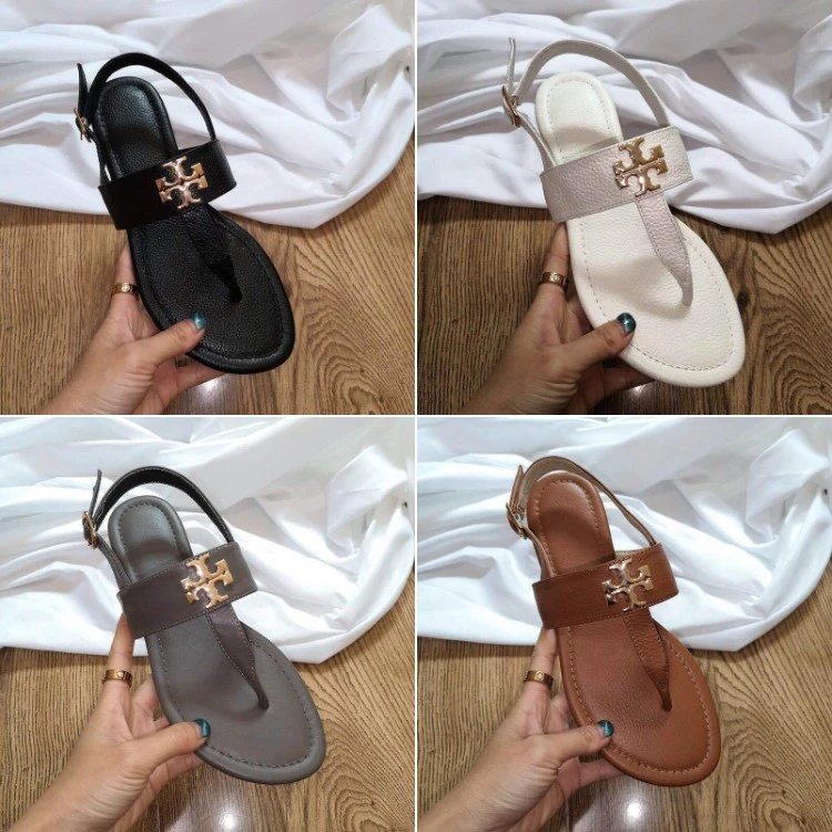 Sandálias Tory Burch — Bico aberto · tira entre os dedos