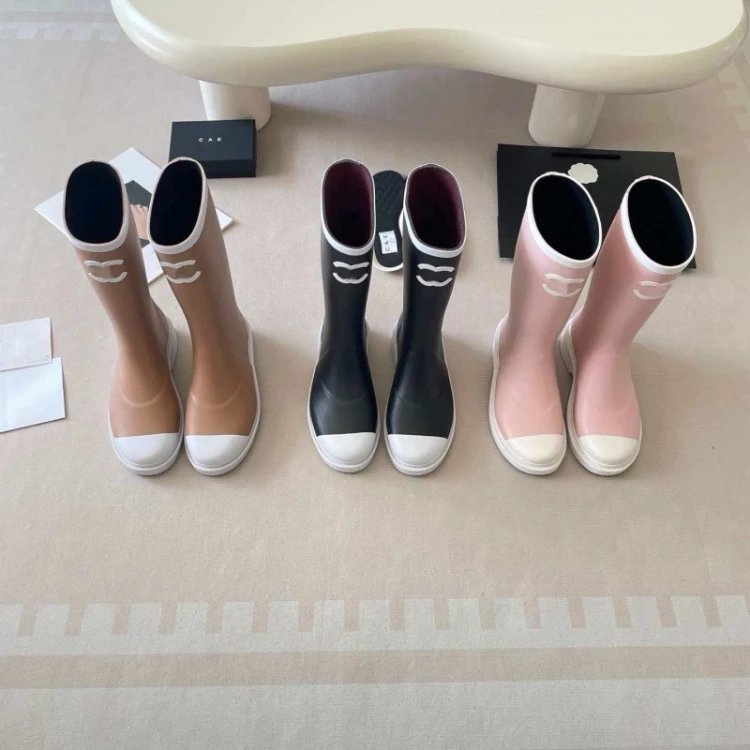 rain boots Chanel — mid-calf · round-toe