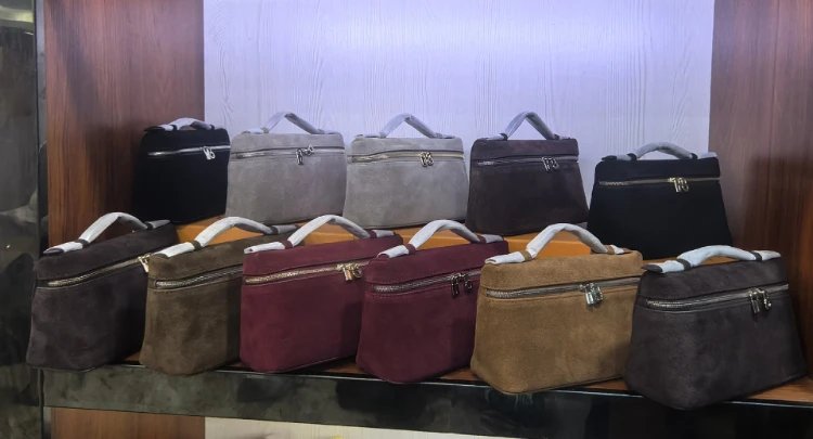 Loro Piana bag — metallic-looking clasp · short handles
