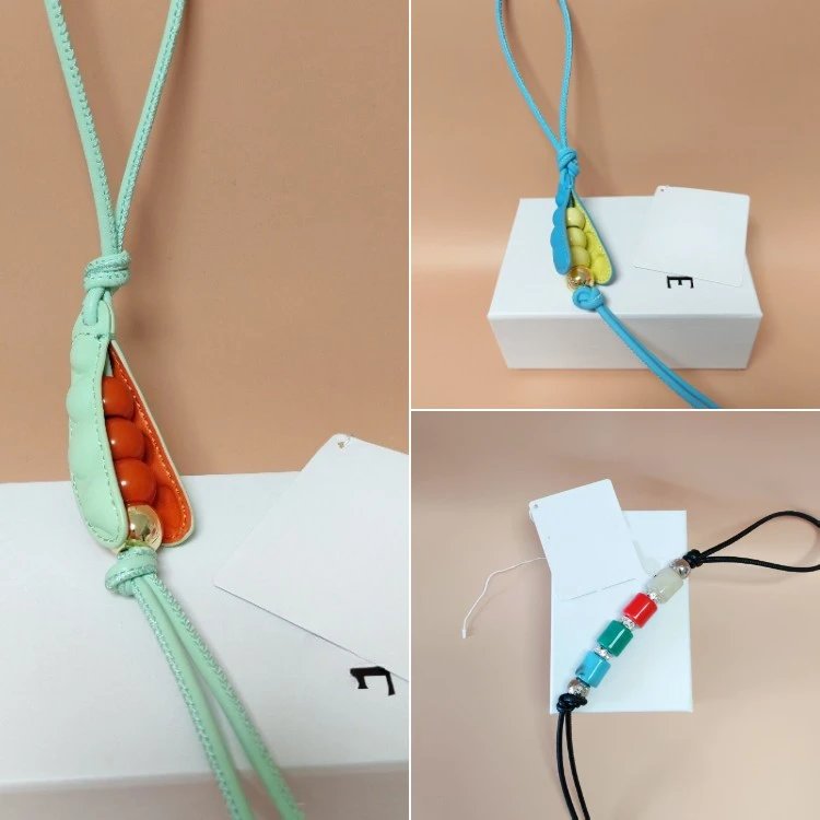Pendentif de sac en forme de cosse de petit pois avec perles