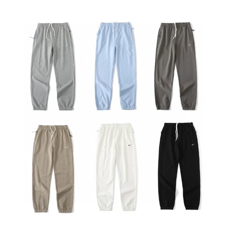 Nike pants — drawstring waistband · tapered silhouette