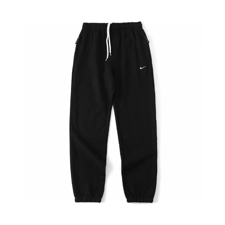 Nike pants — drawstring waistband · tapered silhouette