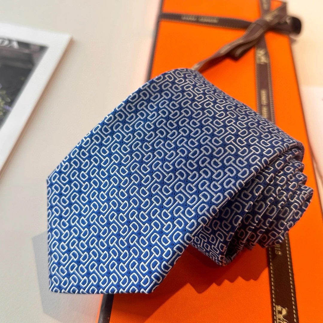 Krawat Hermès — geometryczny nadruk · warianty kolorystyczne