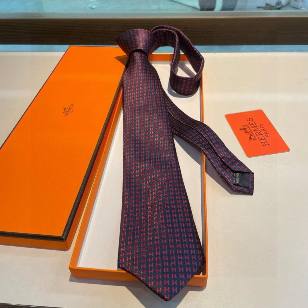 Krawat Hermès z tkanym wzorem H i metką z powozem