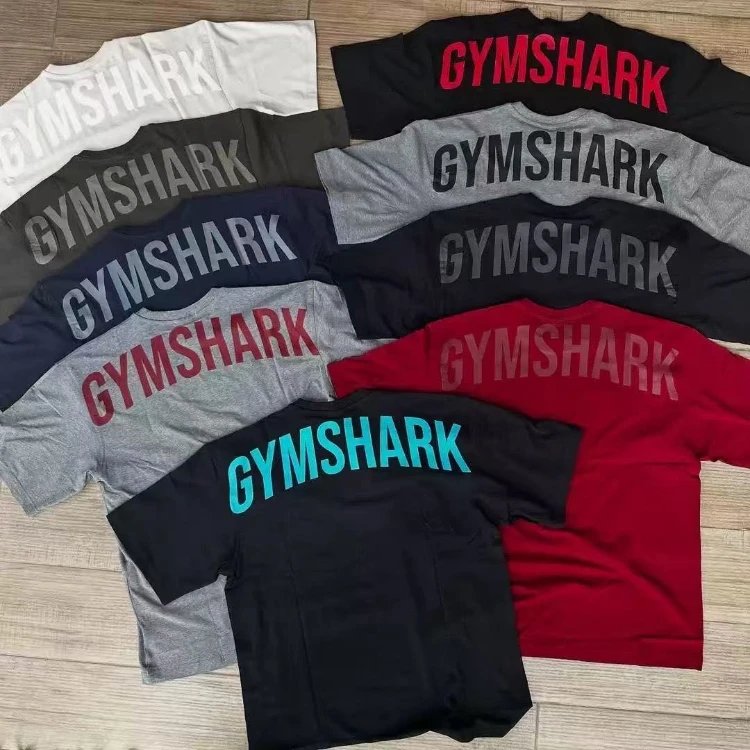 تيشيرت Gymshark — كتابات زخرفية · أكمام قصيرة