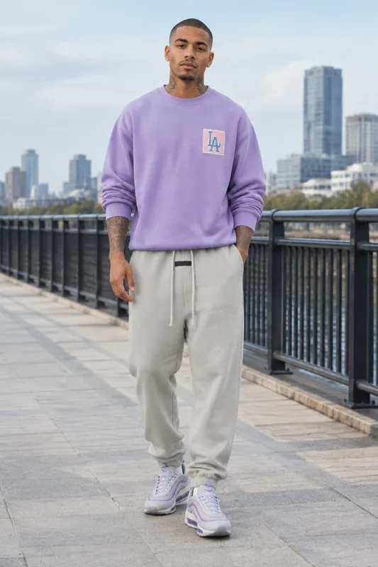 Outfit mit Sweatshirts, Fear of God Essentials und Nike Air Max 97 Low-Top · Milo