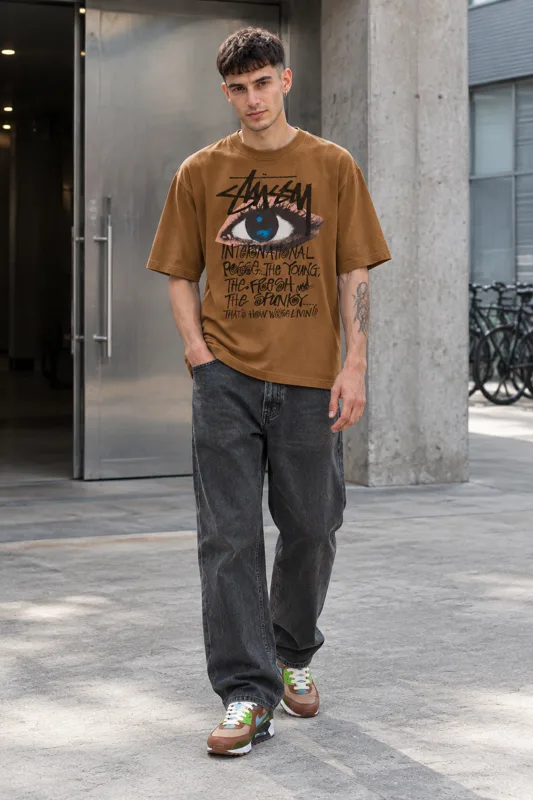 Outfit con T-shirt Stüssy e Sneaker basse stringate · Enzo