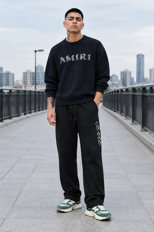Outfit met Amiri Gebreide Trui, Arte Antwerp T-shirt en New Balance Lage Sneakers · Diego