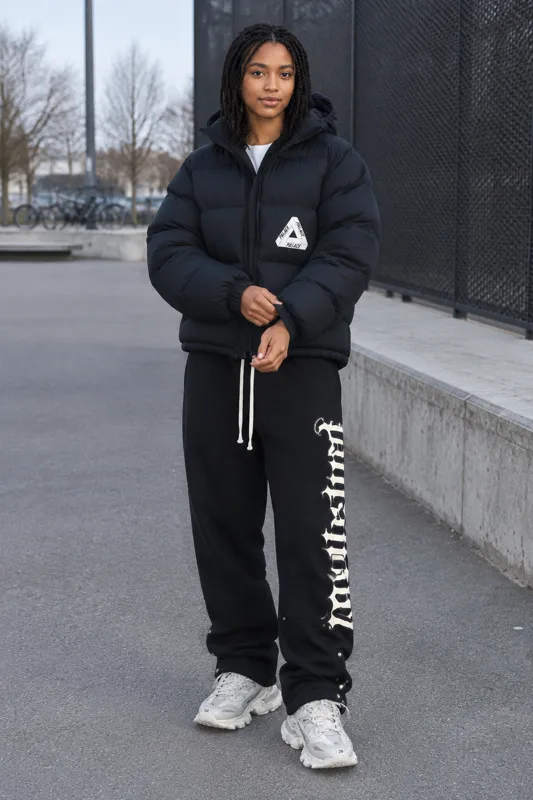Palace Hooded Puffer, Godspeed Gothic Graphic & Balenciaga Track Layered outfit · Nora