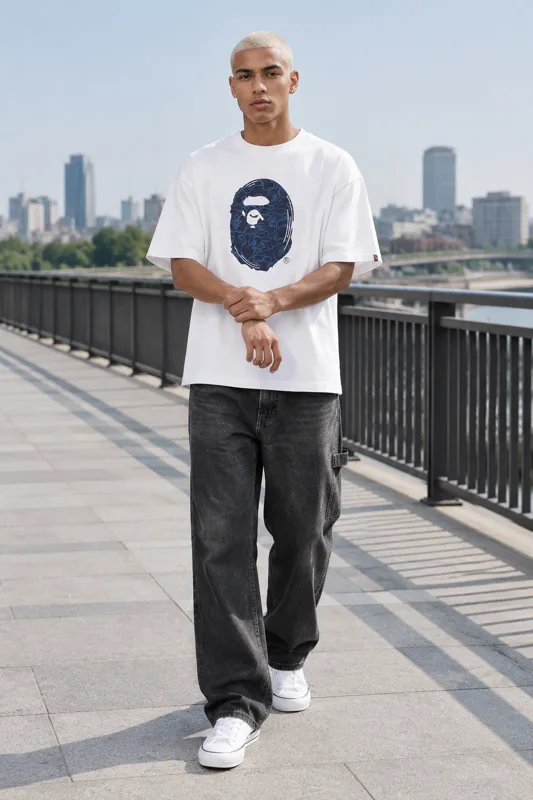White Graphic Tee and Faded Charcoal Carpenter Jeans