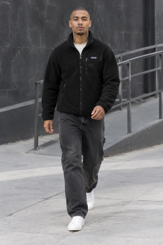 Black Textured Fleece Jacket and Faded Charcoal Jeans