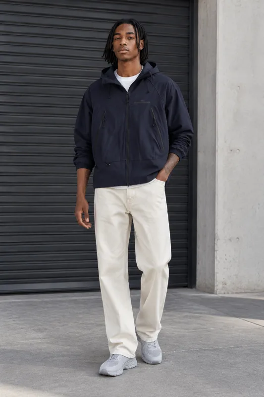 Navy Hooded Windbreaker and Off-White Wide Trousers · Zion