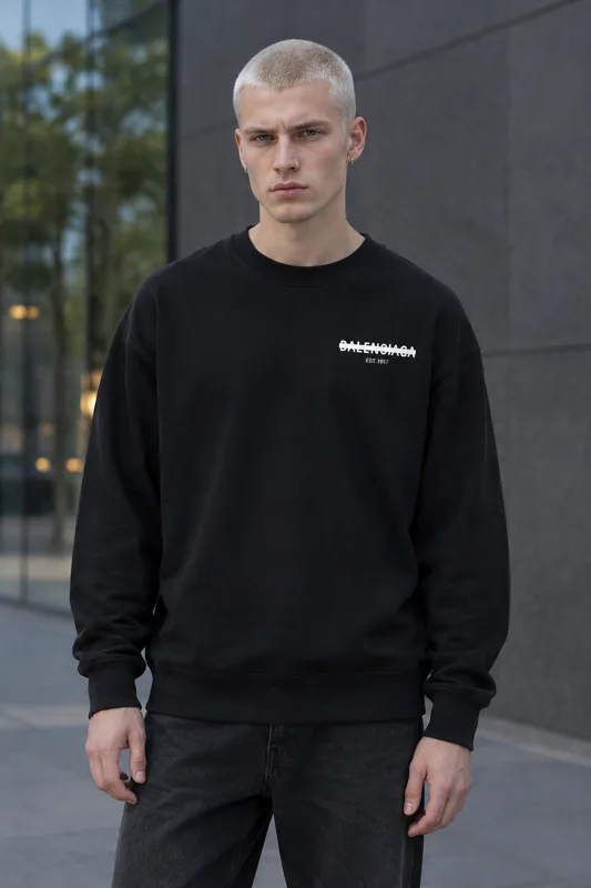 Oversized Black Sweatshirt and Faded Charcoal Jeans